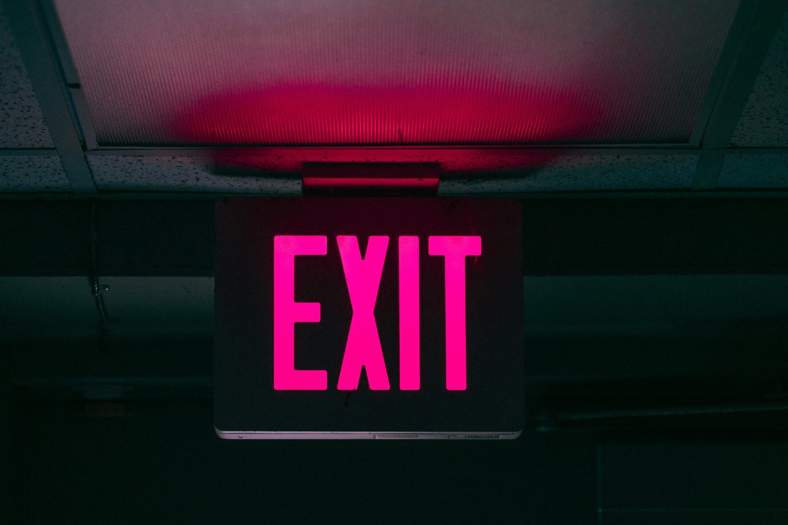 An Exit Sign in Pink: https://unsplash.com/photos/black-and-pink-exit-signage-9PjefVw5EII